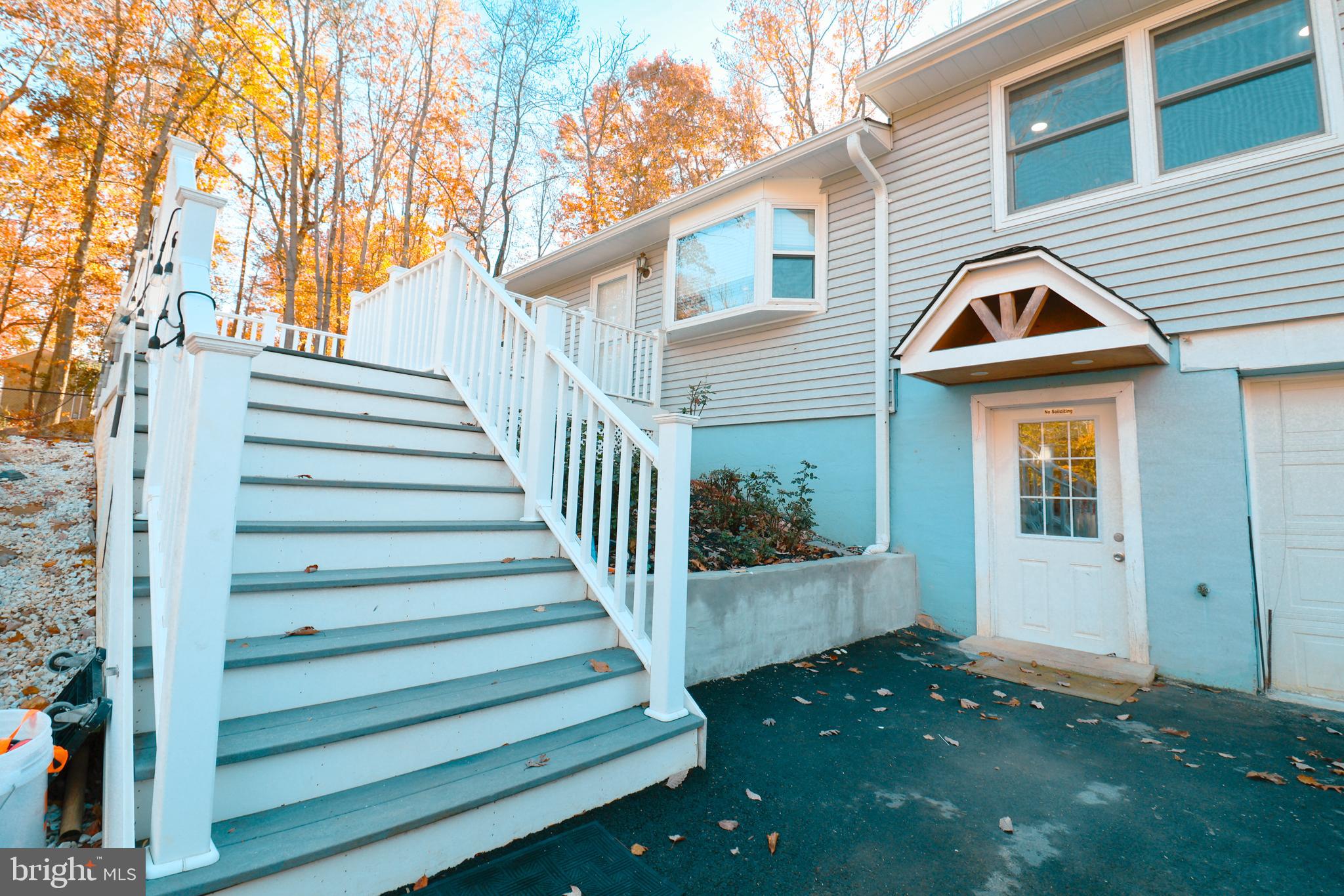 12704 Purcell Road Manassas, VA 20112 - Photo 5 of 47 a view of a house with a yard and stairs