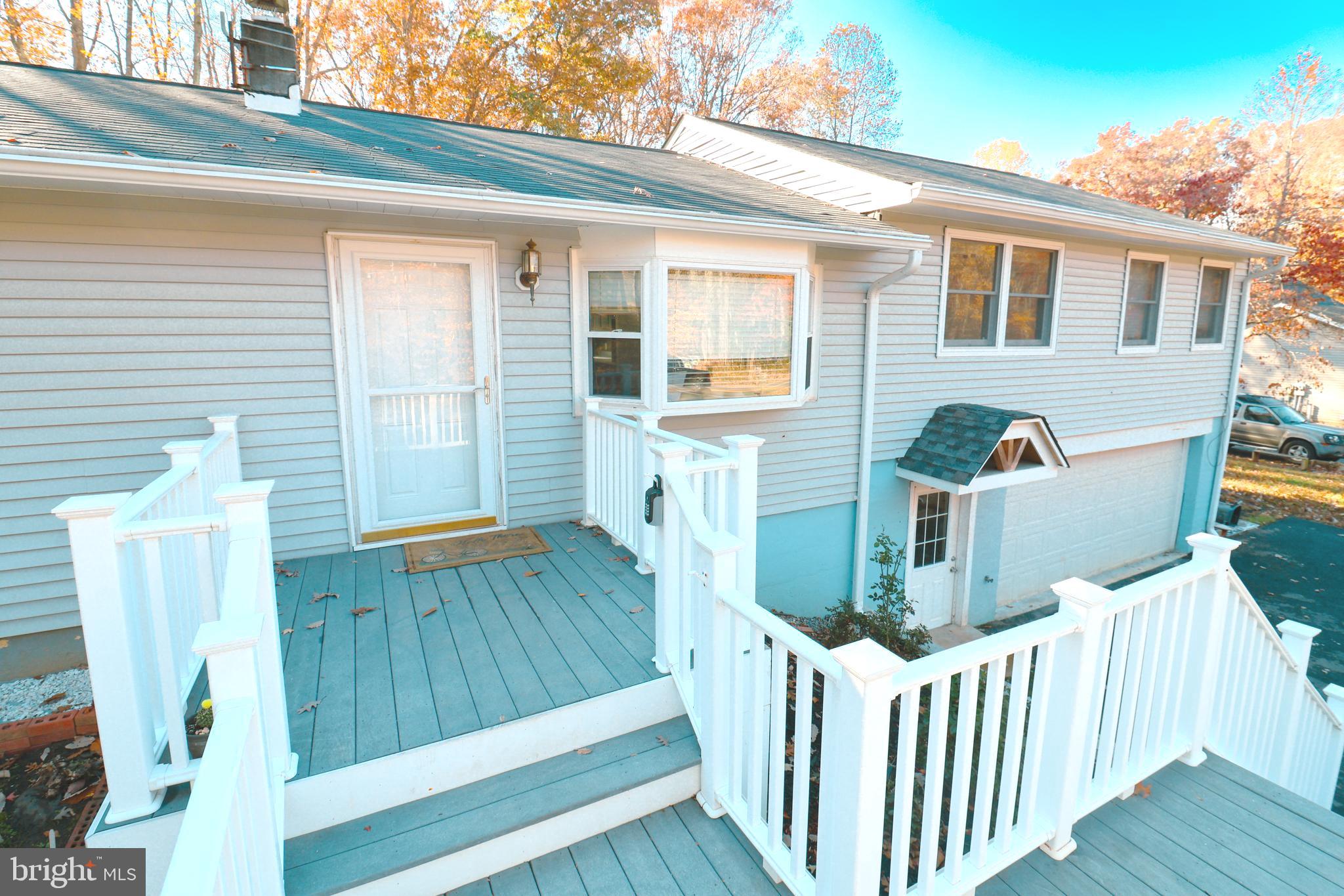 12704 Purcell Road Manassas, VA 20112 - Photo 7 of 47 a front view of house with deck