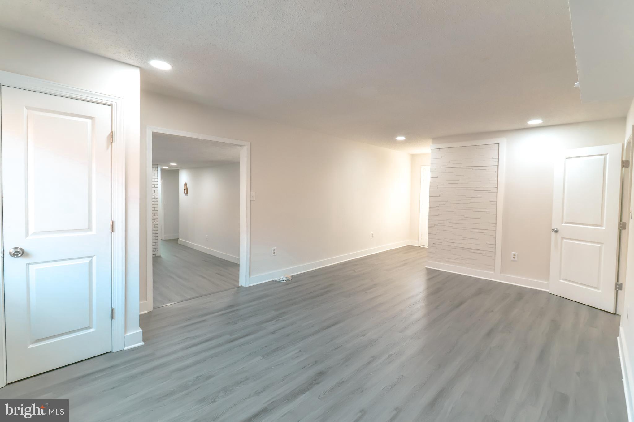 12704 Purcell Road Manassas, VA 20112 - Photo 10 of 47 a view of an empty room with wooden floor