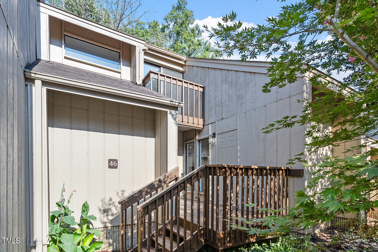 4100 Five Oaks Drive, Unit 46 Durham, NC 27707 - Photo 28 of 36 a view of a balcony with a tree