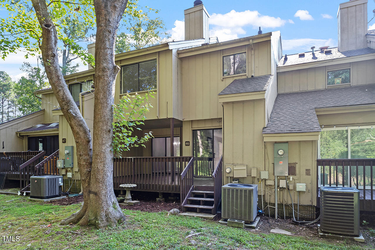 4100 Five Oaks Drive, Unit 46 Durham, NC 27707 - Photo 31 of 36 front view of a house with a yard
