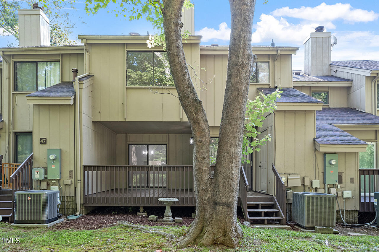 4100 Five Oaks Drive, Unit 46 Durham, NC 27707 - Photo 32 of 36 front view of a house with a porch