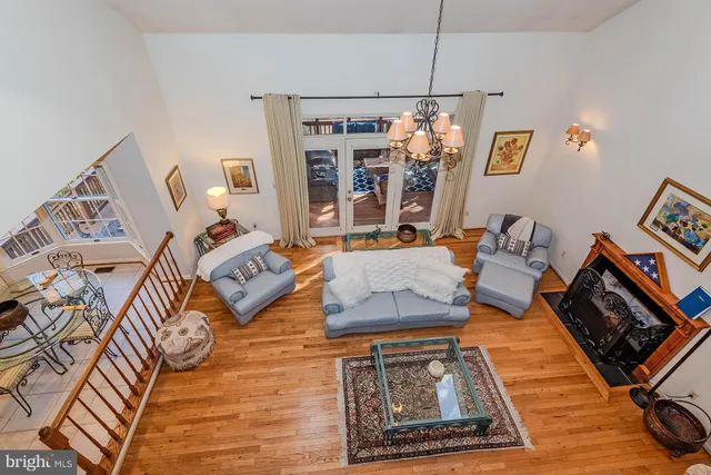 a living room with furniture and a rug