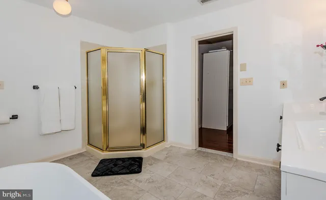 a view of a bathroom with mirror