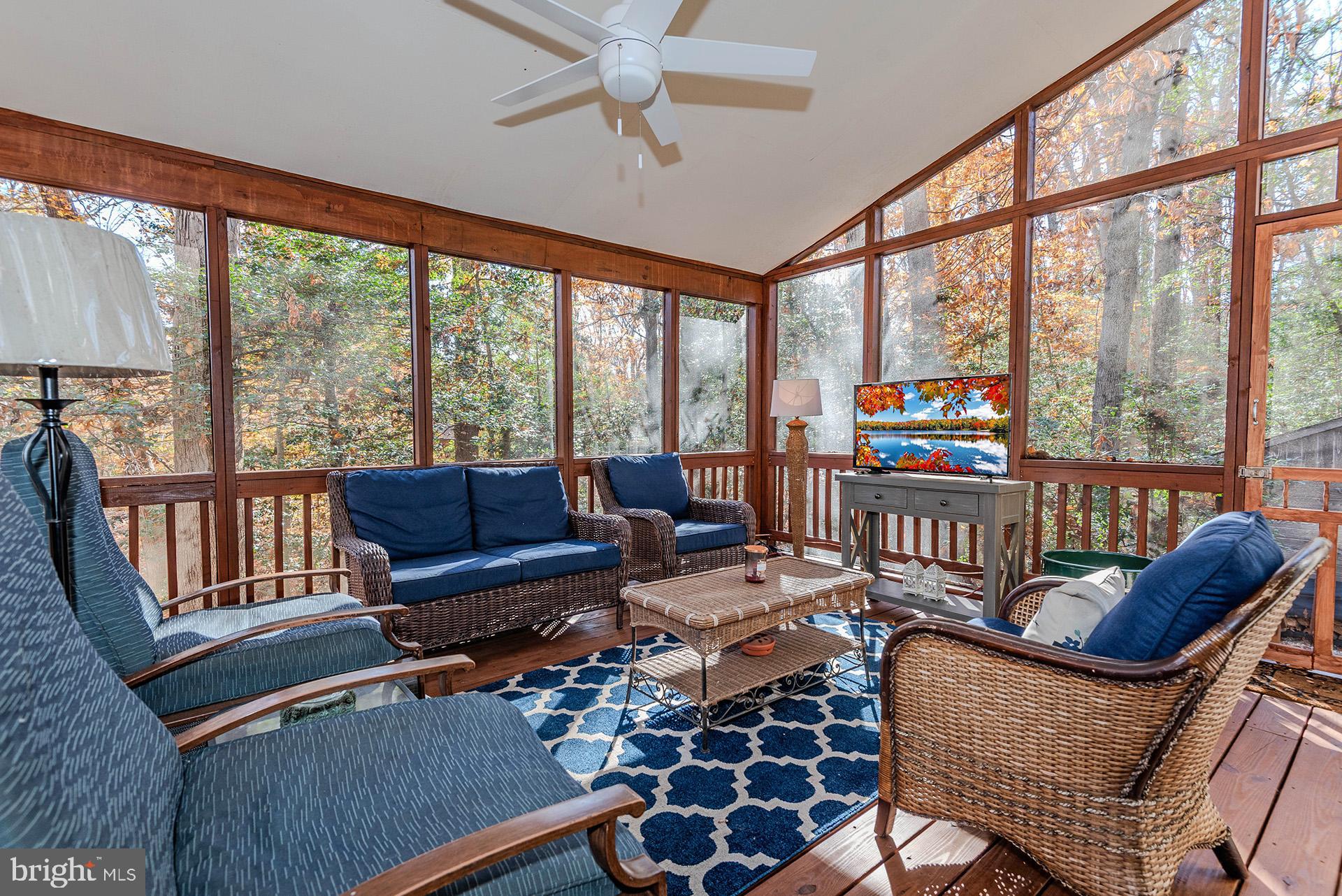 621 Wood Lot Trail Road Annapolis, MD 21401 - Photo 39 of 44 a living room with furniture and a large window