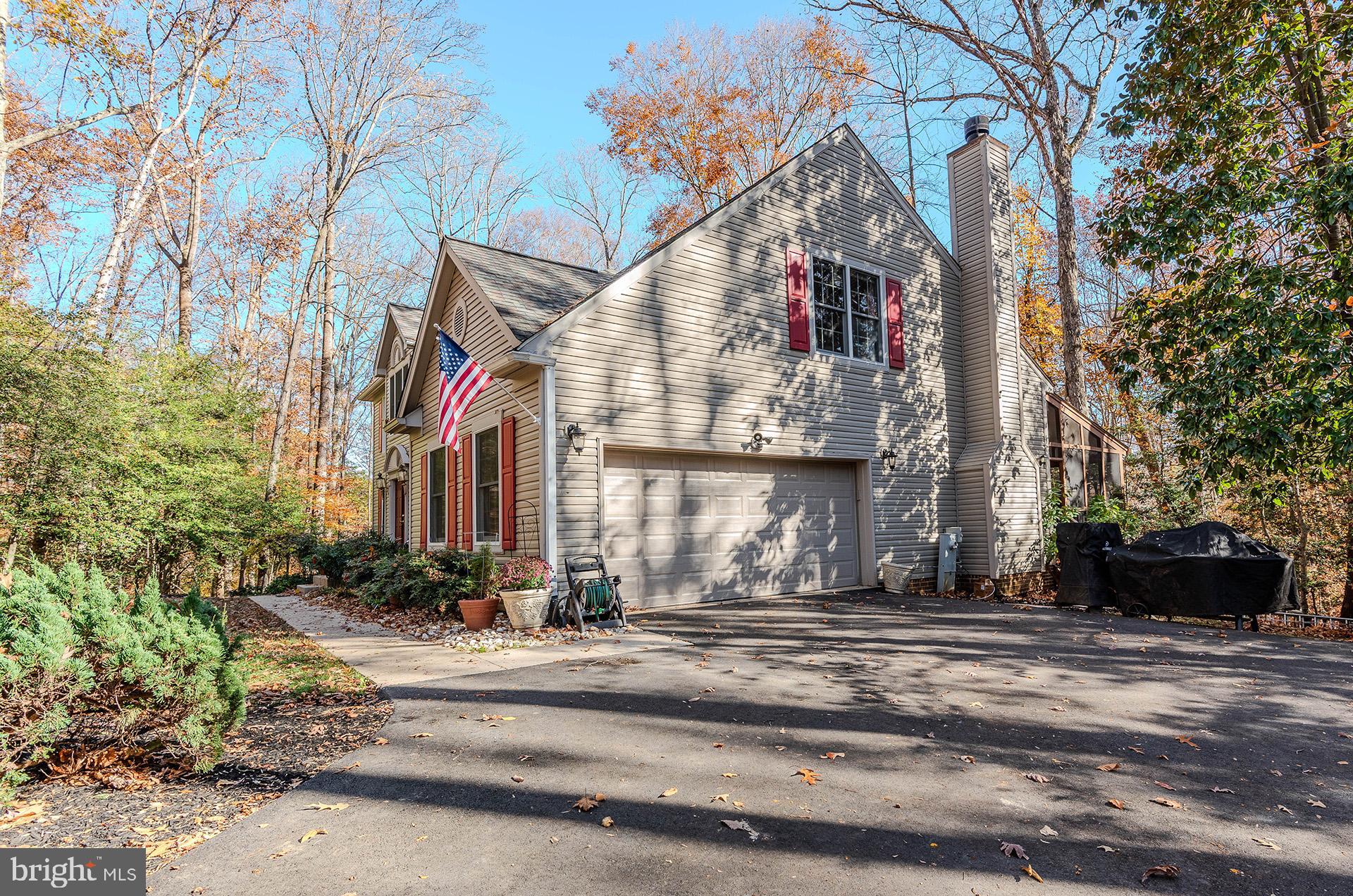 621 Wood Lot Trail Road Annapolis, MD 21401 - Photo 4 of 44 a view of a building with a street
