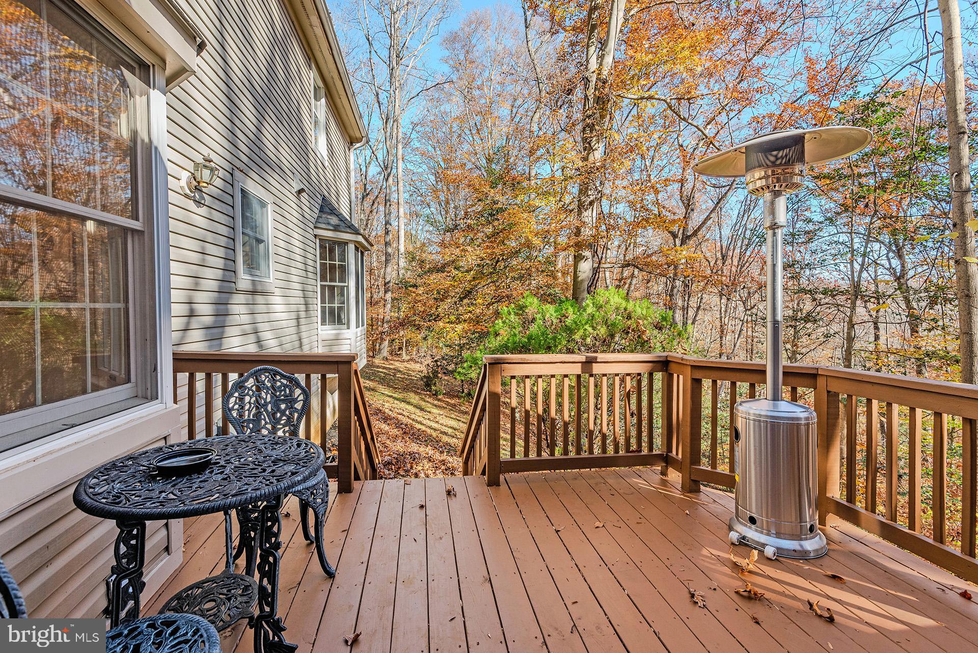 621 Wood Lot Trail Road Annapolis, MD 21401 - Photo 41 of 44 a view of a chairs and table on the wooden floor