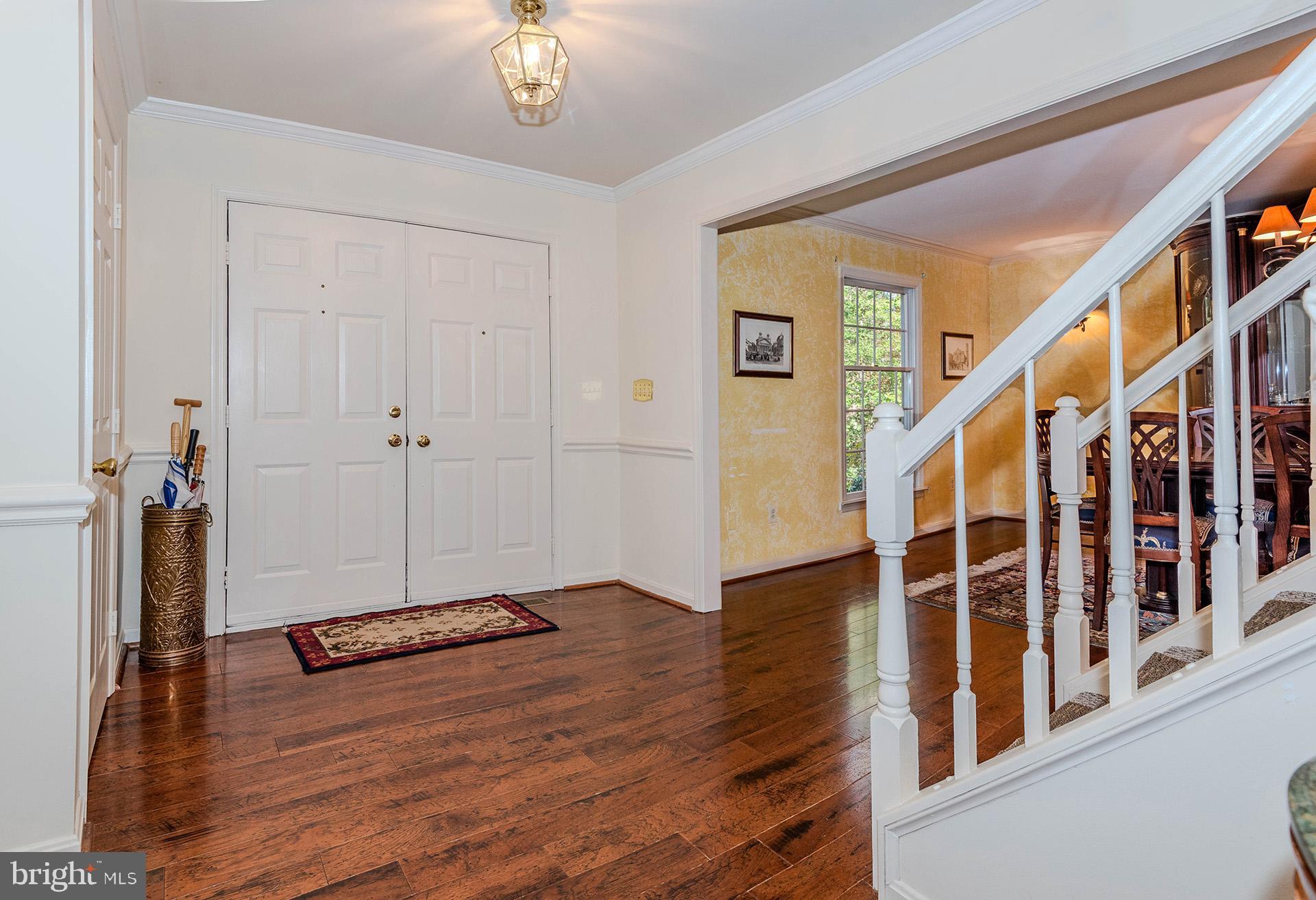 621 Wood Lot Trail Road Annapolis, MD 21401 - Photo 5 of 44 a view of an entryway with wooden floor