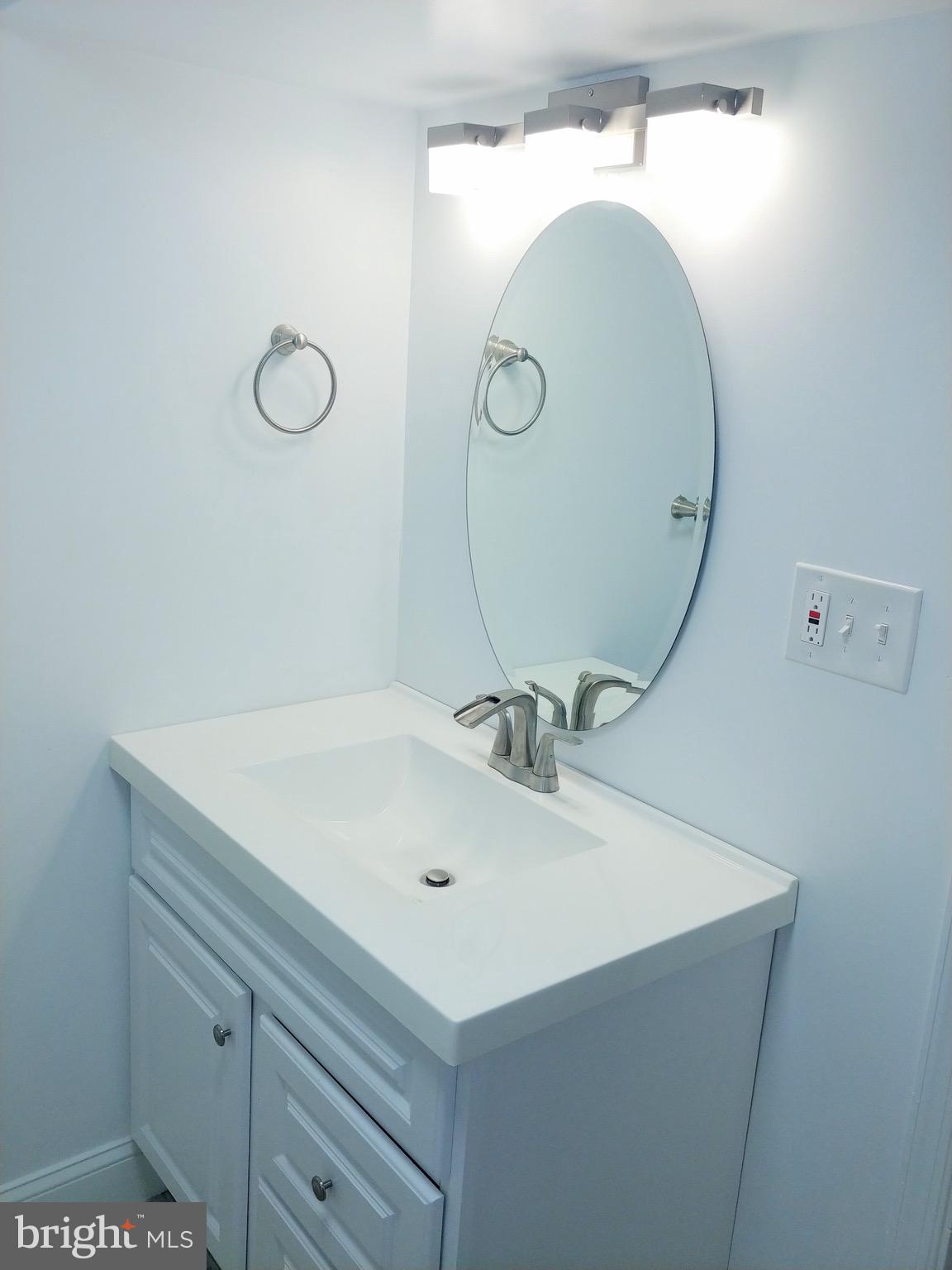 1602 Roundhill Road Baltimore, MD 21218 - Photo 13 of 23 Lower Level Bath Vanity