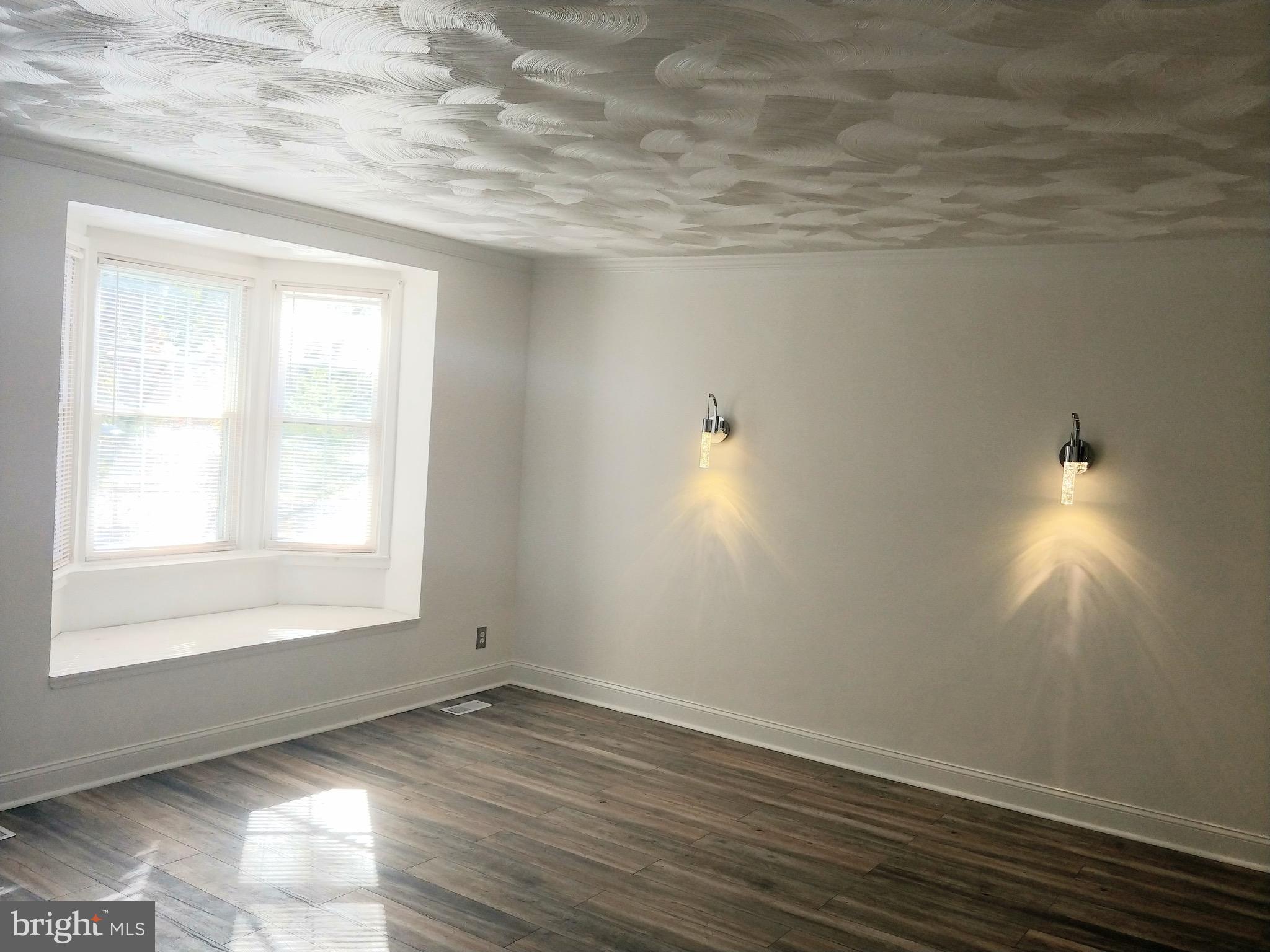 1602 Roundhill Road Baltimore, MD 21218 - Photo 3 of 23 Living Room with Window Seat