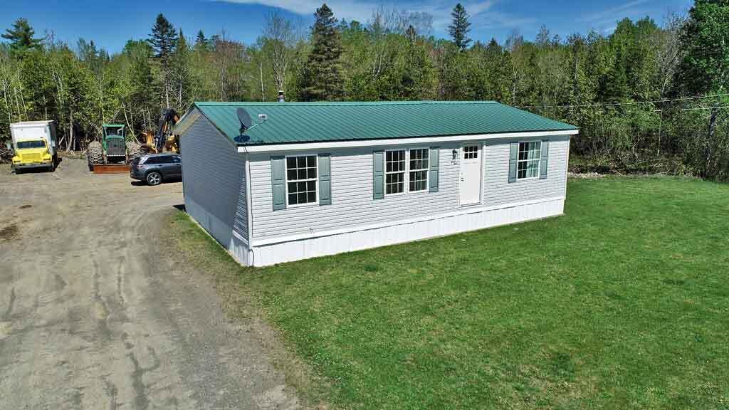3157 Military Road Haynesville, ME 04497 - Photo 2 of 47 front-ranch-home-haynesvill