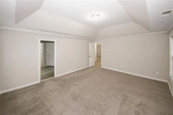 an empty room with an entryway