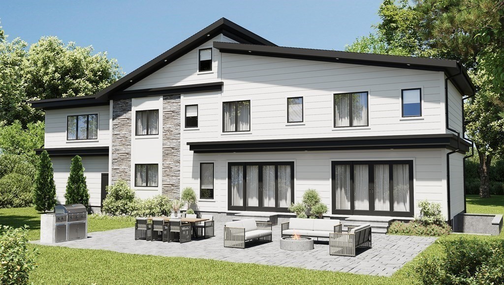 5 Kappius Path Newton, MA 02459 - Photo 2 of 15 a front view of a house with yard and seating space