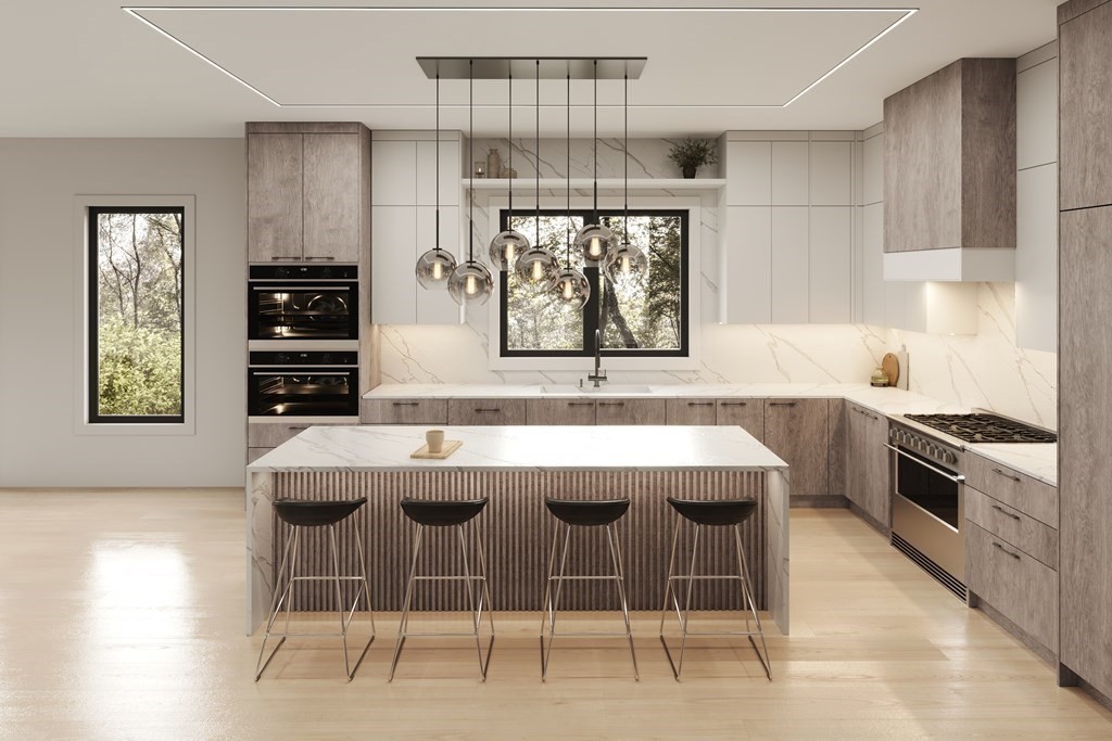 5 Kappius Path Newton, MA 02459 - Photo 3 of 15 a kitchen with stainless steel appliances granite countertop a stove and a refrigerator