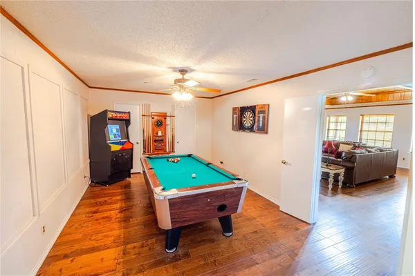 a room with furniture and a wooden floor