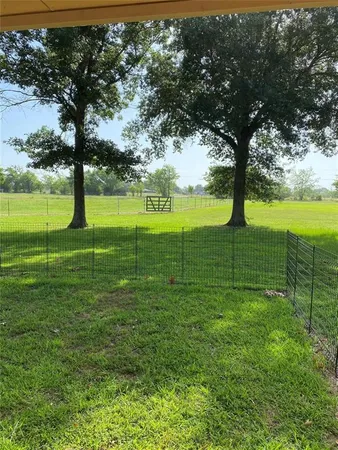 a view of an ocean with a big yard