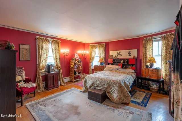 a bed room with a bed and a couch