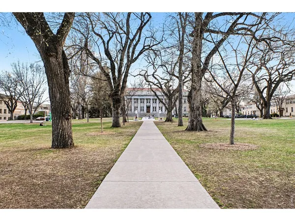 a building with trees in the background