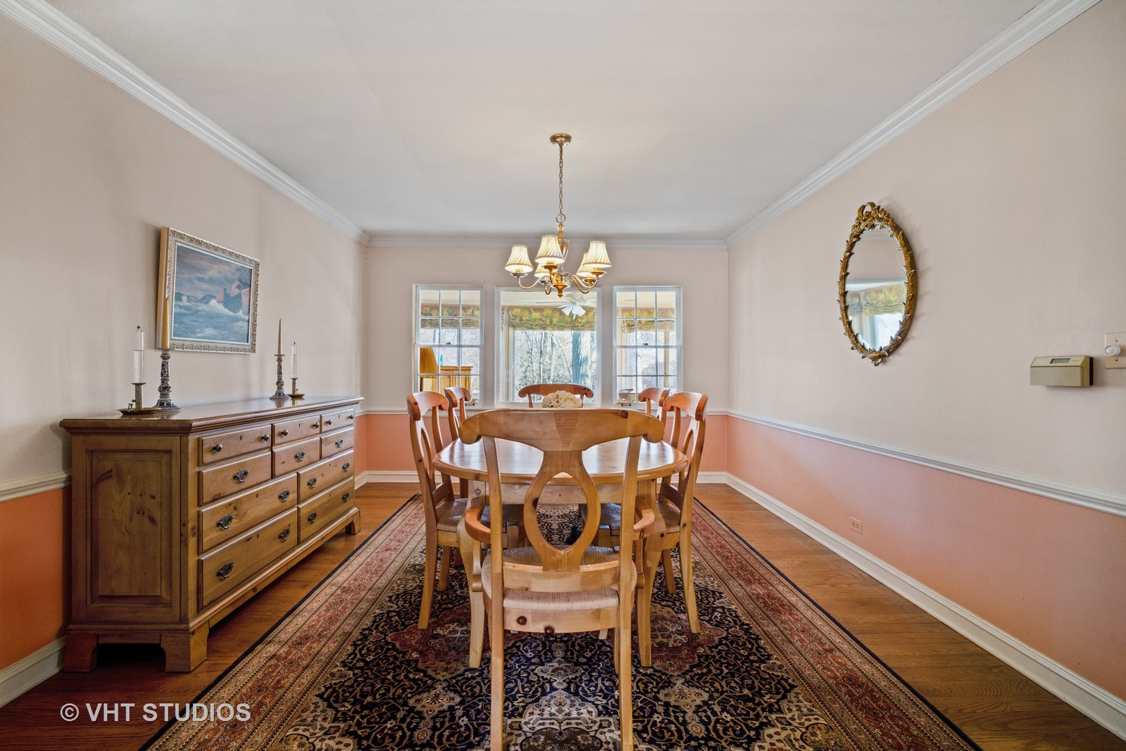 2009 Sunset Ridge Road Glenview, IL 60025 - Photo 11 of 25 a view of a dining room with furniture window and wooden floor