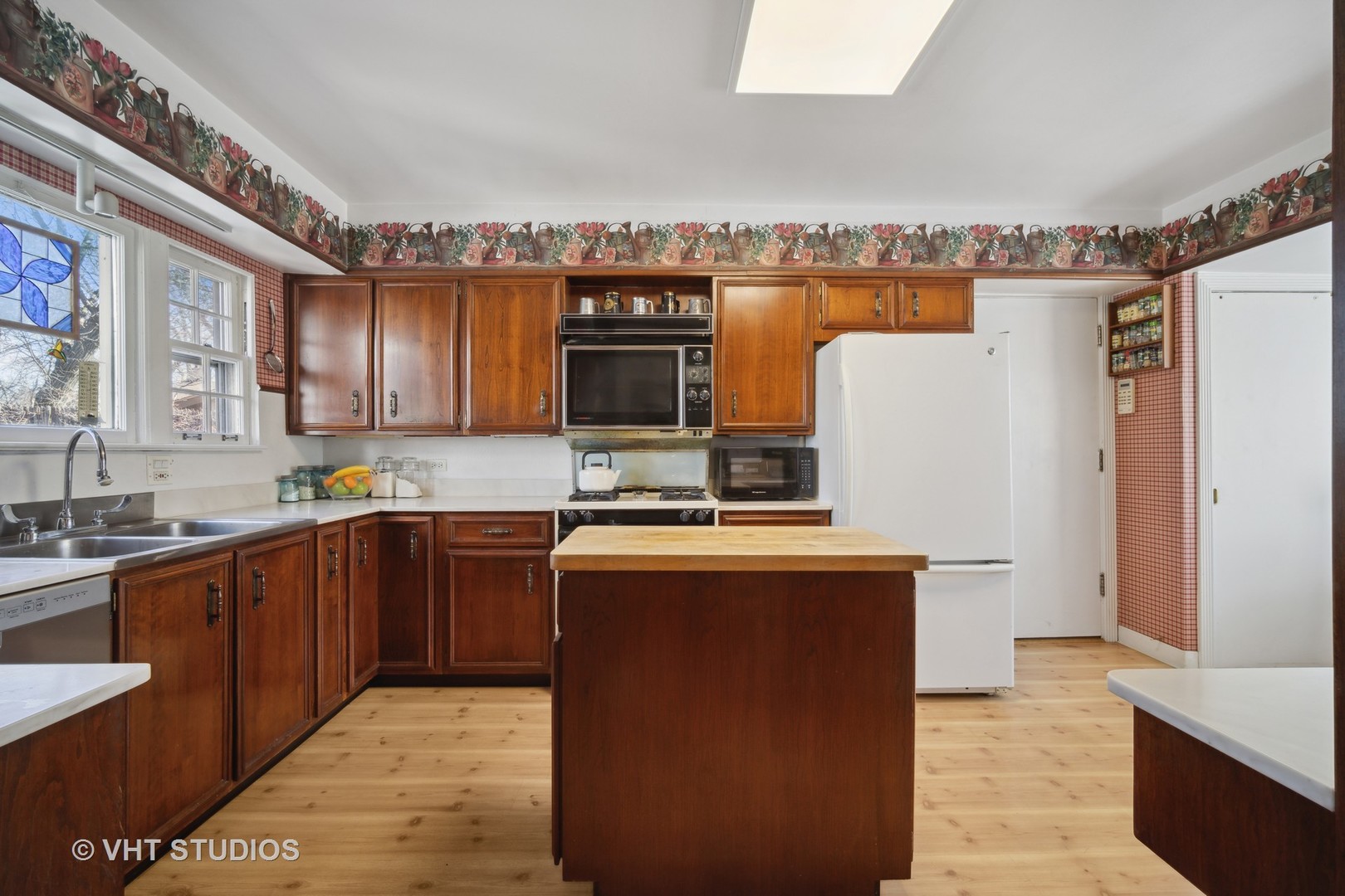 2009 Sunset Ridge Road Glenview, IL 60025 - Photo 14 of 25 a kitchen with stainless steel appliances granite countertop a refrigerator a stove and a sink