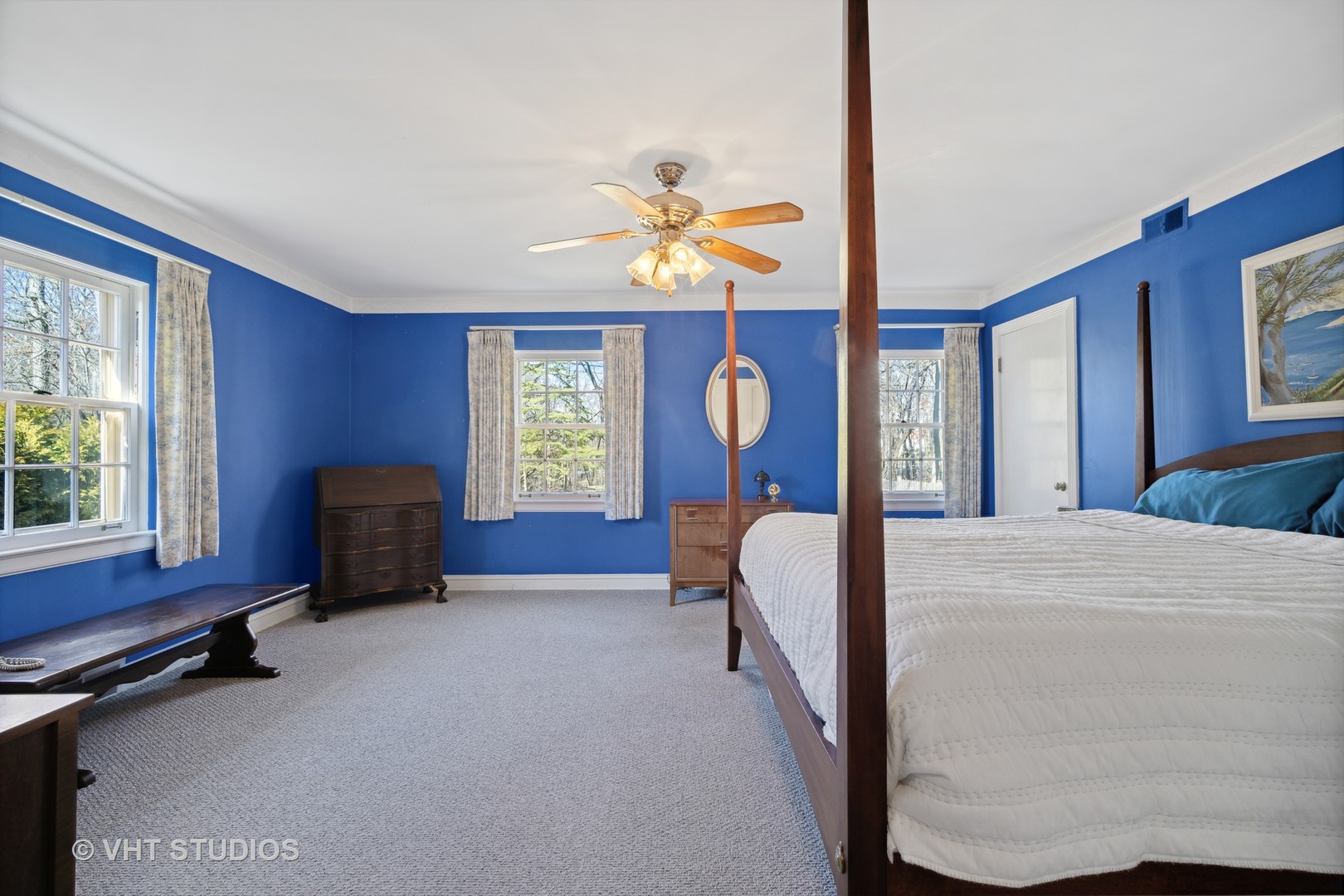 2009 Sunset Ridge Road Glenview, IL 60025 - Photo 17 of 25 a bedroom with a bed and a chandelier