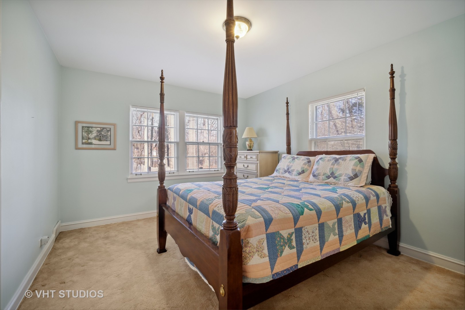 2009 Sunset Ridge Road Glenview, IL 60025 - Photo 19 of 25 a bed sitting in a bedroom next to a window