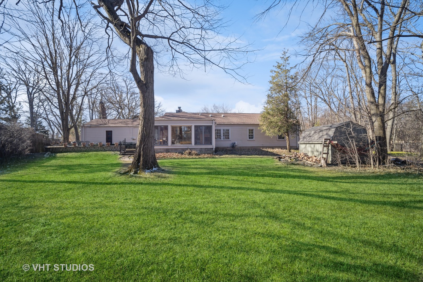 2009 Sunset Ridge Road Glenview, IL 60025 - Photo 4 of 25 a view of a house with a big yard