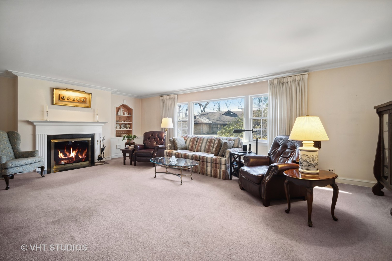 2009 Sunset Ridge Road Glenview, IL 60025 - Photo 9 of 25 a living room with furniture and a fireplace