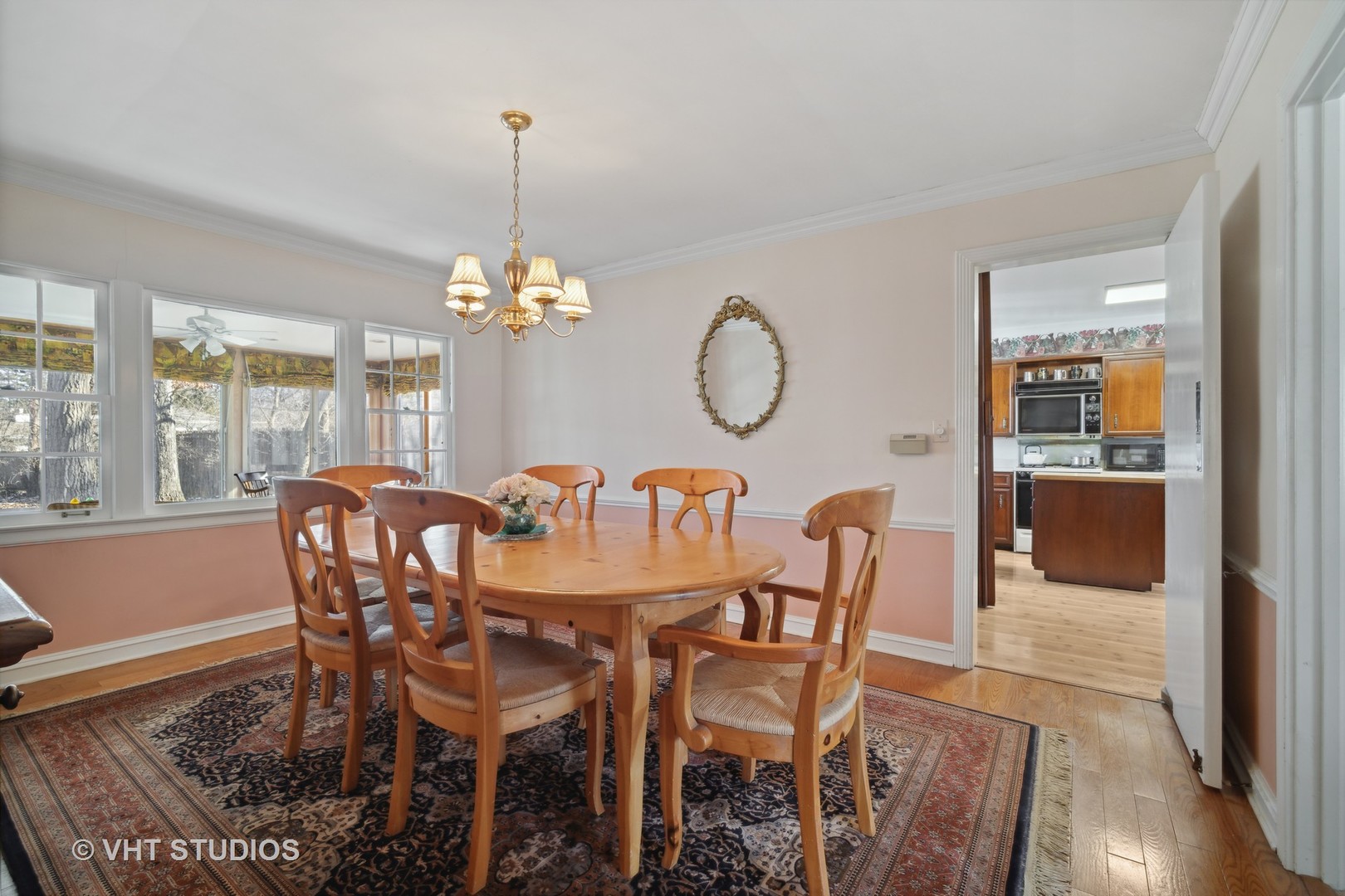 2009 Sunset Ridge Road Glenview, IL 60025 - Photo 10 of 25 a dining room with furniture a chandelier and wooden floor