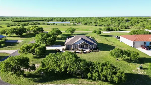 an aerial view of a house with garden