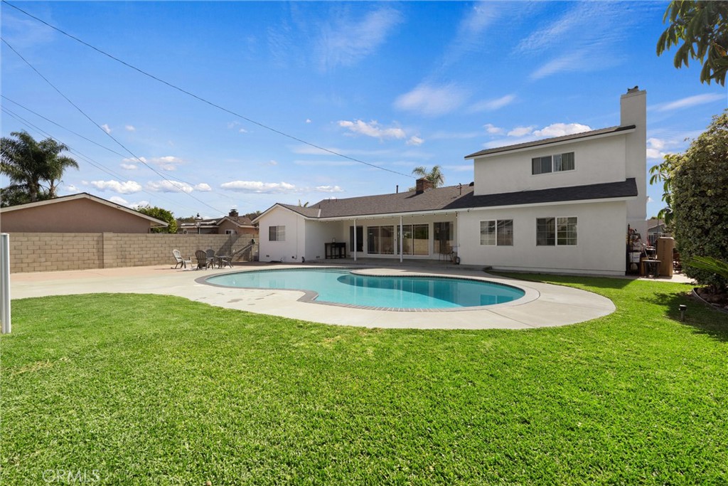 1675 West Mells Lane Anaheim, CA 92802 - Photo 39 of 46 a view of house with swimming pool