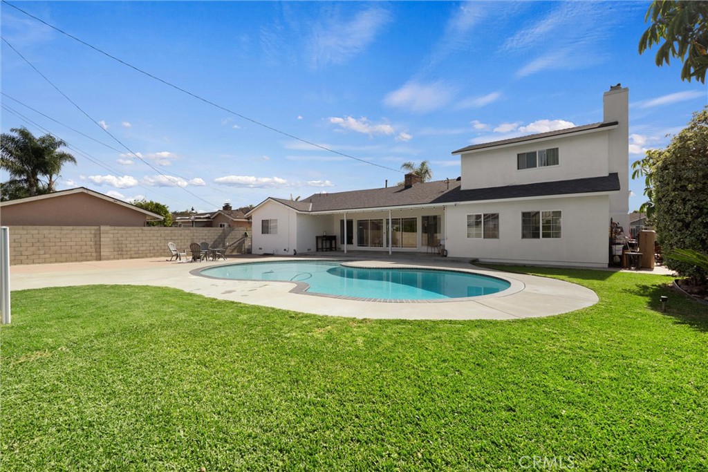 1675 West Mells Lane Anaheim, CA 92802 - Photo 40 of 46 a view of house with swimming pool