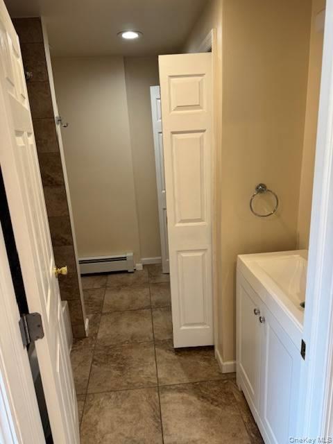 8 Old Albany Post Road, Unit A Ossining, NY 10562 - Photo 6 of 14 a bathroom with a sink and a mirror