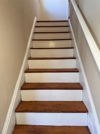 a view of entryway with a front door