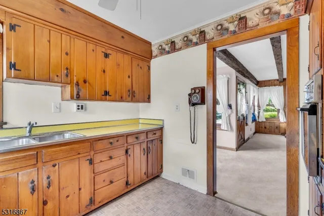 a view of a walk in closet and bedroom