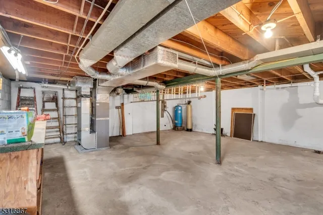 a view of a field of grass and trees