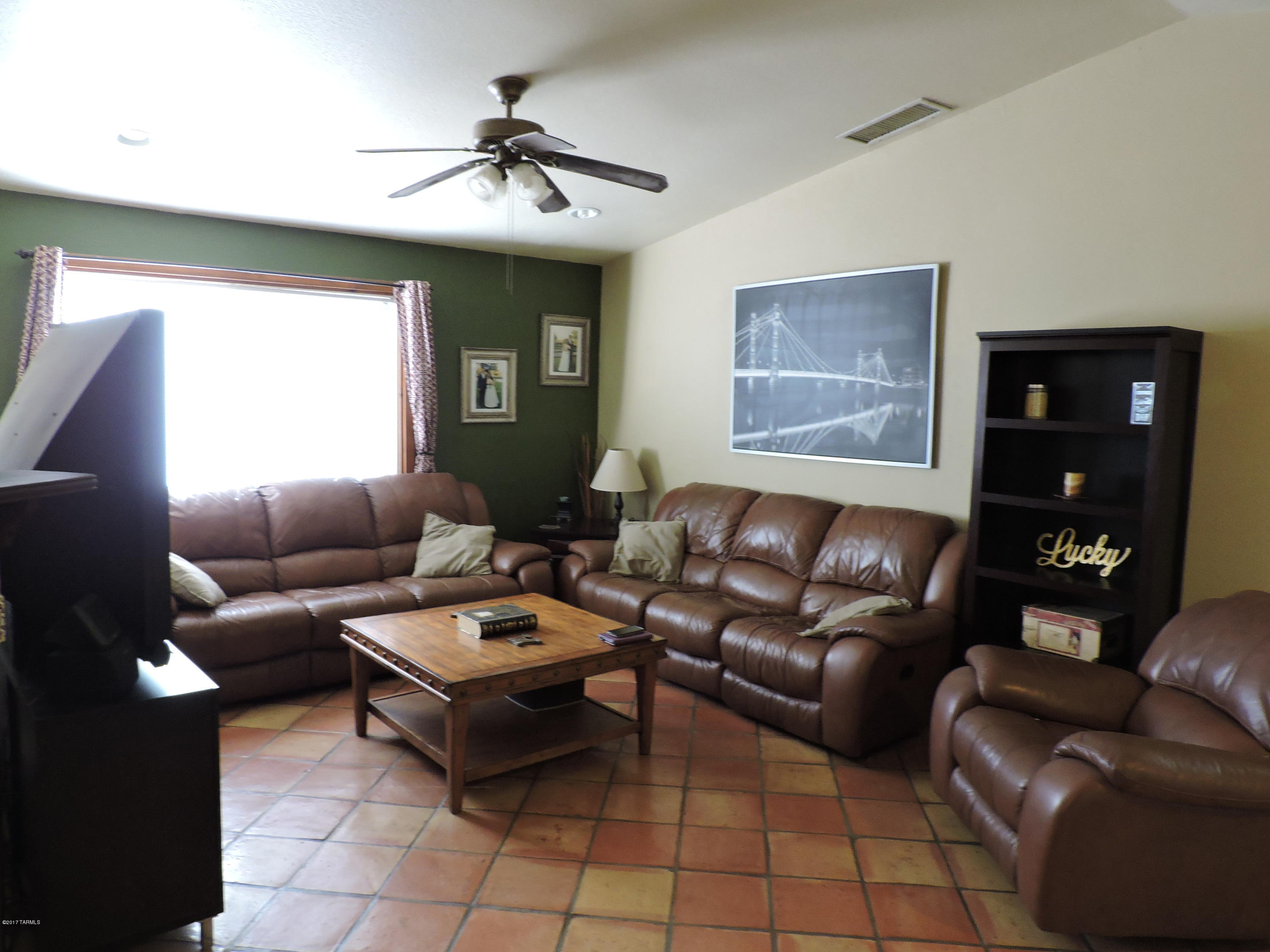 2709 West Firebrook Road Tucson, AZ 85741 - Photo 1 of 17 a living room with furniture and a window