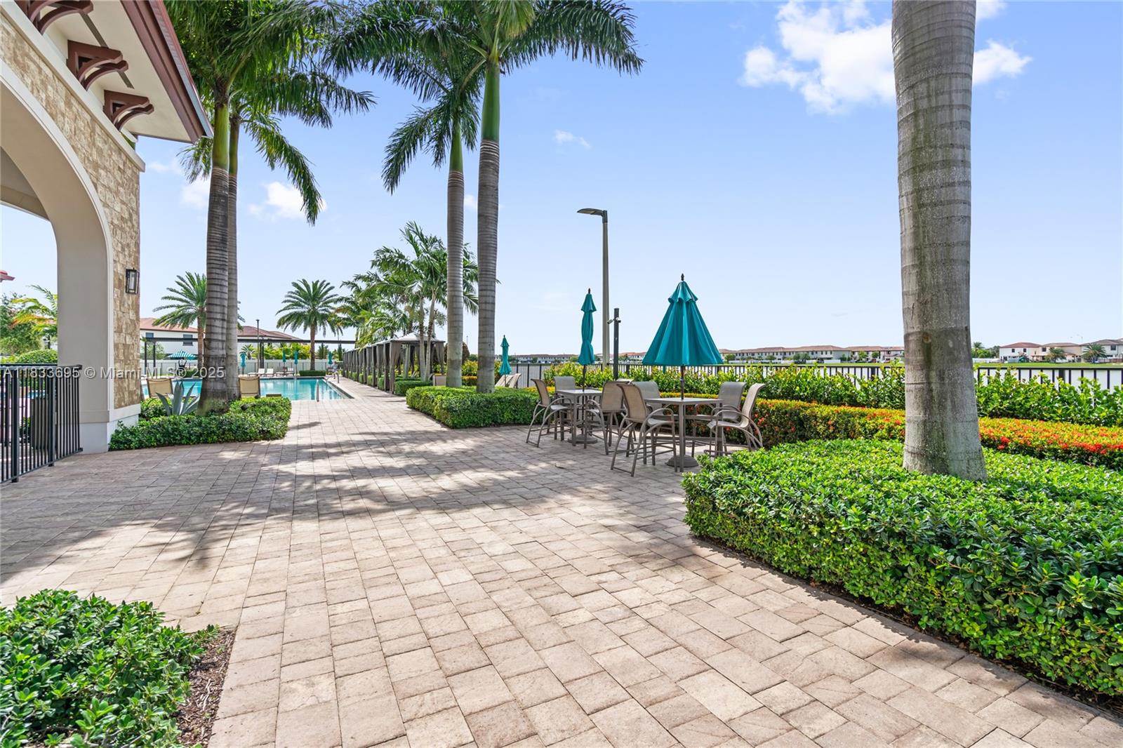10468 West 33rd Lane Hialeah, FL 33018 - Photo 62 of 77 a view of a park with a bench and trees
