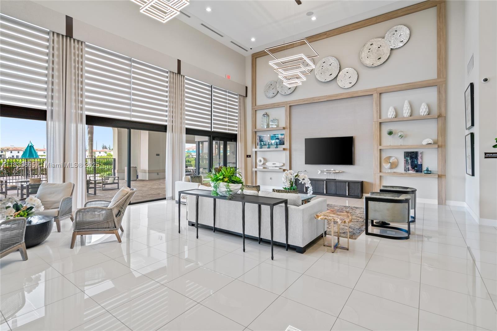 10468 West 33rd Lane Hialeah, FL 33018 - Photo 73 of 77 a living room with furniture a flat screen tv and a fireplace