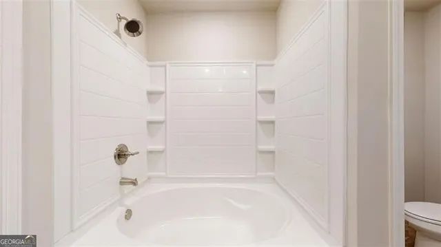 a bathroom with a bathtub