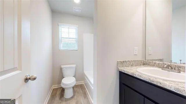 a bathroom with a bathtub