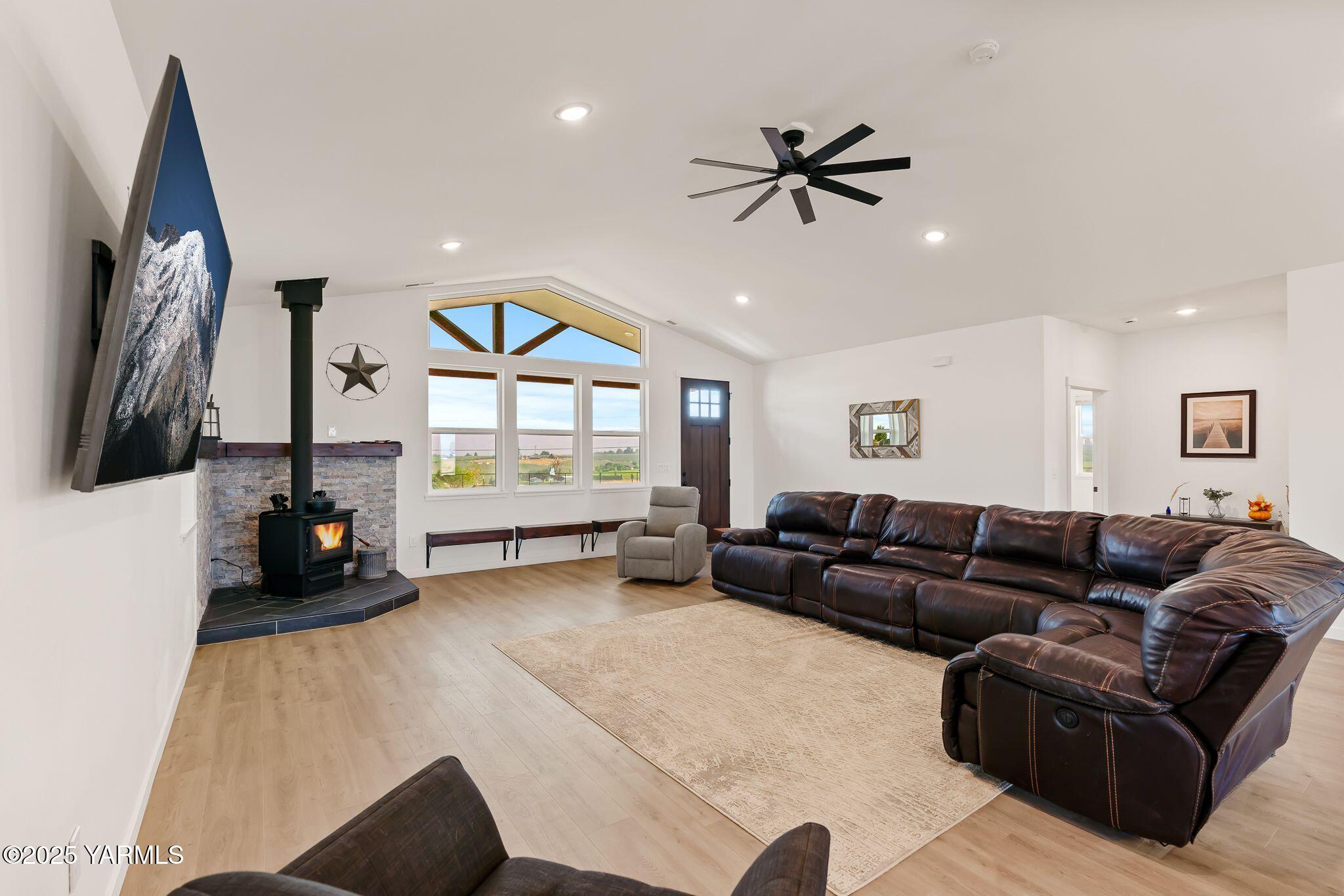 12907 Douglas Road Yakima, WA 98908 - Photo 3 of 44 a living room with furniture and a flat screen tv