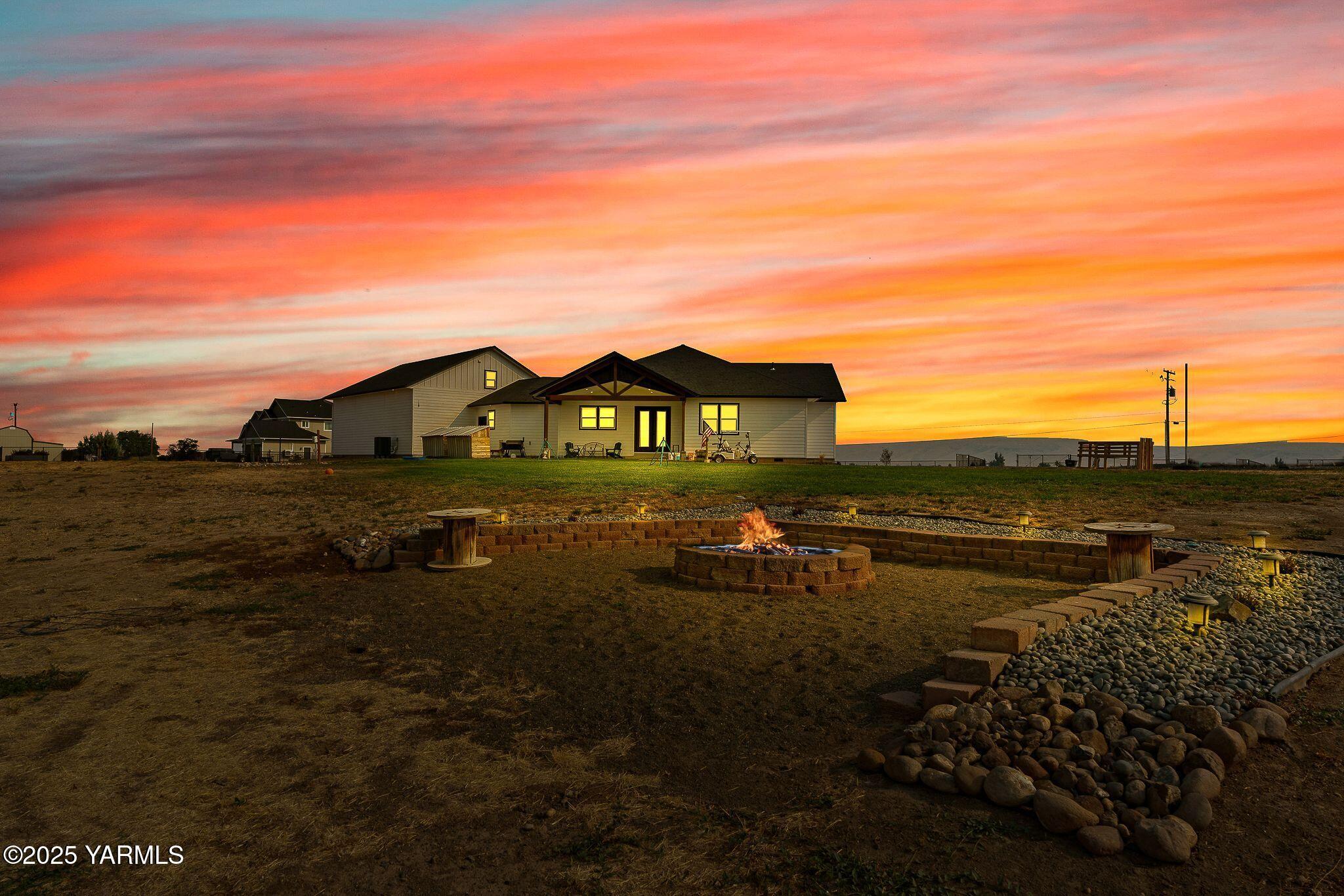 12907 Douglas Road Yakima, WA 98908 - Photo 35 of 44 a view of a lake in front of the house