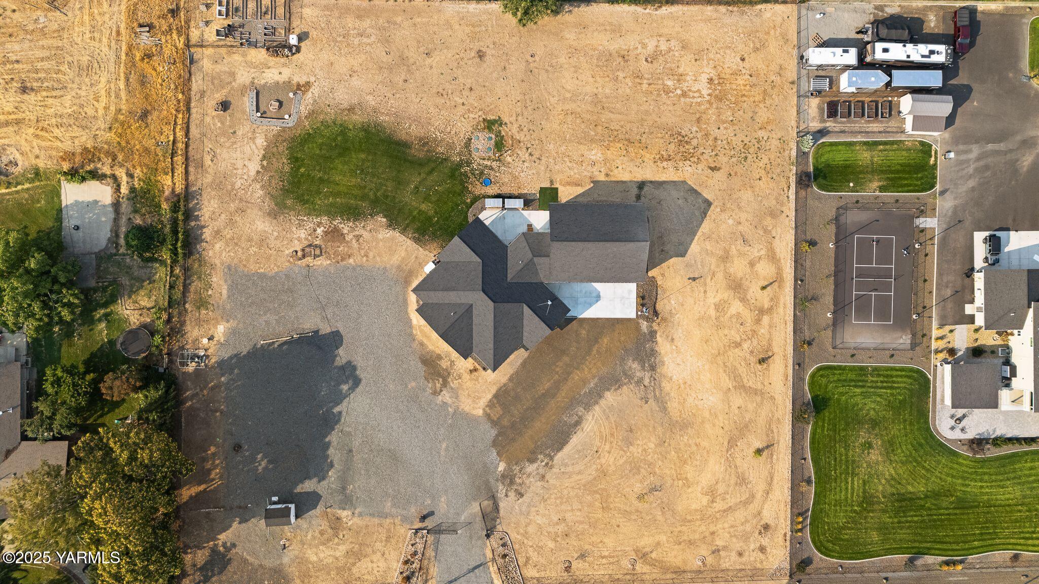 12907 Douglas Road Yakima, WA 98908 - Photo 38 of 44 an aerial view of residential houses with outdoor space
