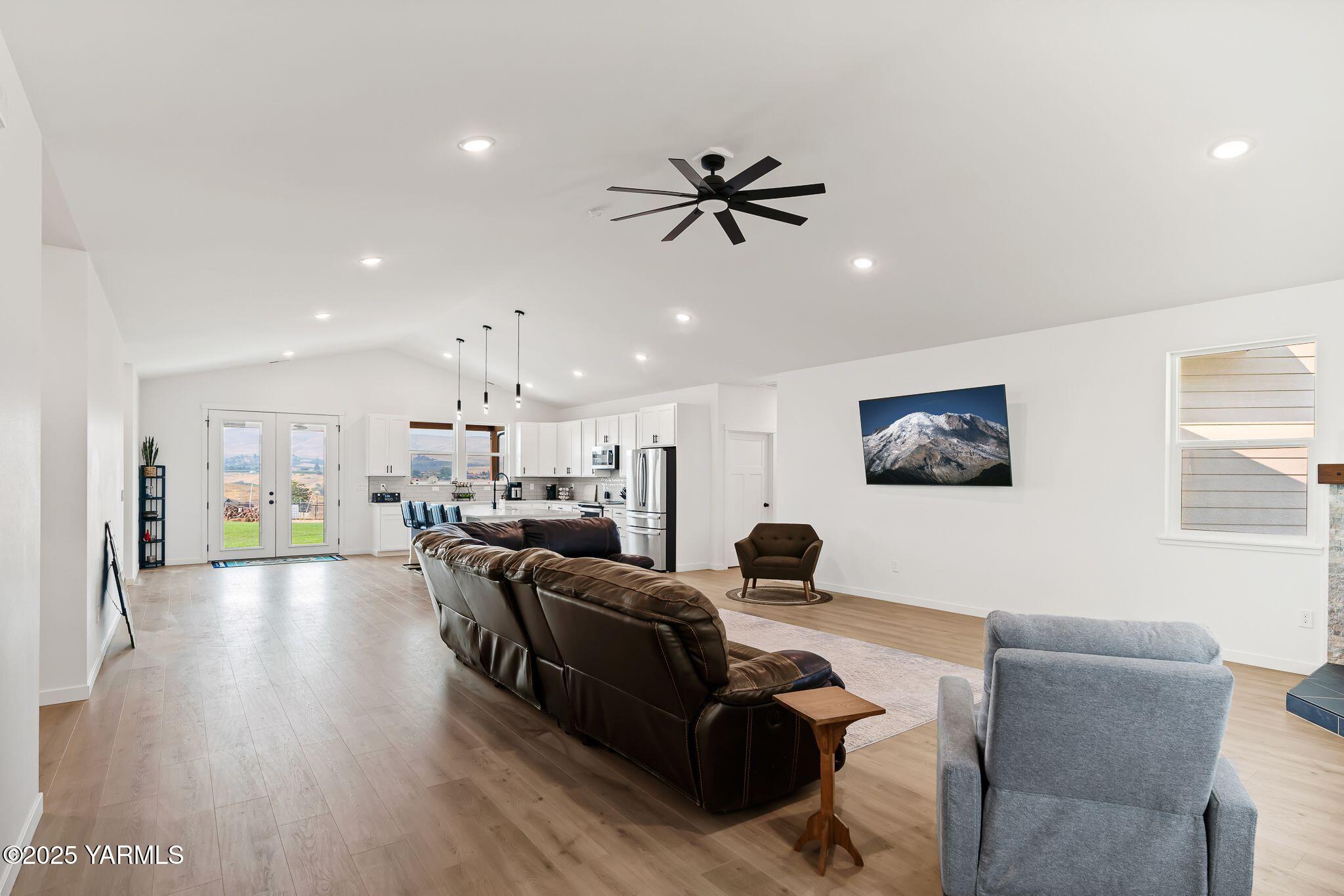 12907 Douglas Road Yakima, WA 98908 - Photo 6 of 44 a living room with furniture and a view of kitchen