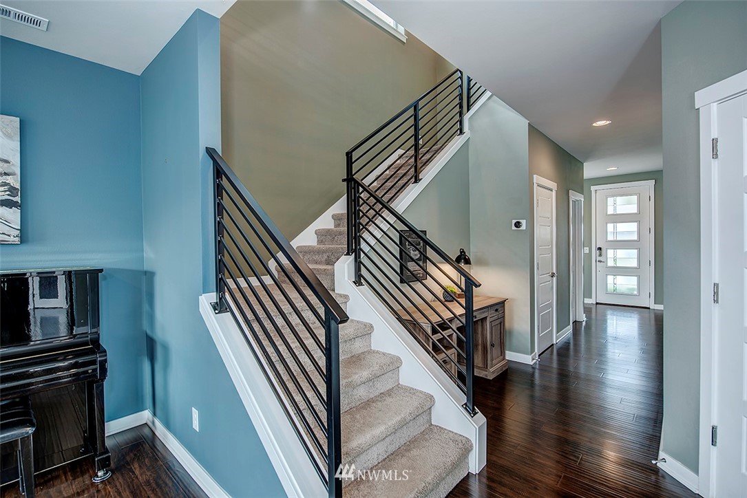 19310 37th Drive Southeast Bothell, WA 98012 - Photo 19 of 22 a view of entryway and hall with wooden floor