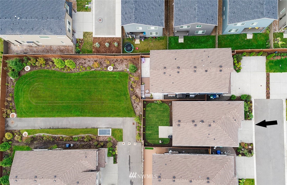 19310 37th Drive Southeast Bothell, WA 98012 - Photo 3 of 22 an aerial view of a house with a garden and signage