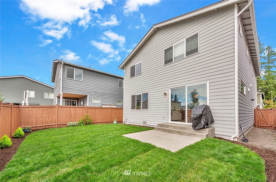 19310 37th Drive Southeast Bothell, WA 98012 - Photo 21 of 22 a front view of house with yard and outdoor seating
