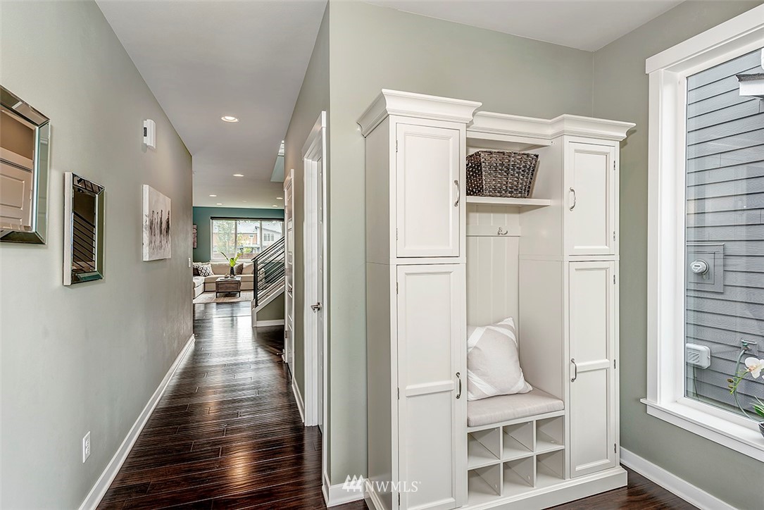 19310 37th Drive Southeast Bothell, WA 98012 - Photo 4 of 22 a view of a hallway with wooden floor and windows