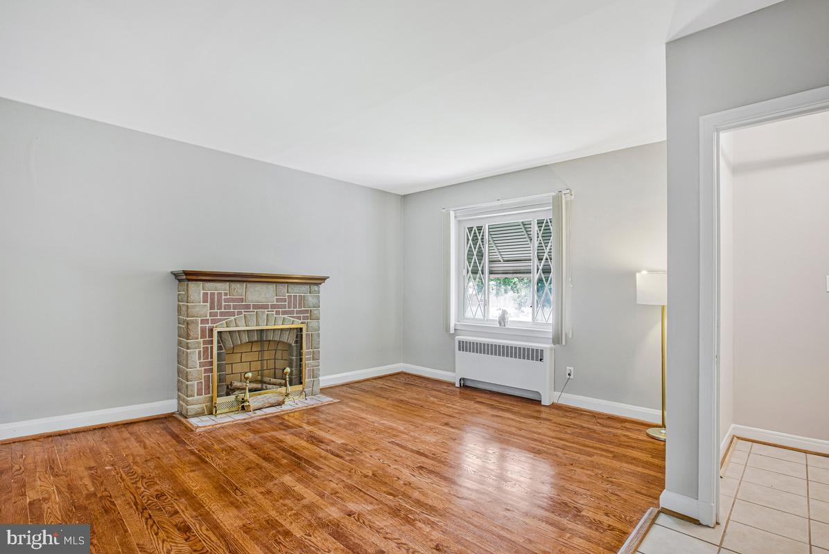 3040 Federal Street Baltimore, MD 21213 - Photo 9 of 41 a view of empty room with wooden floor and fan
